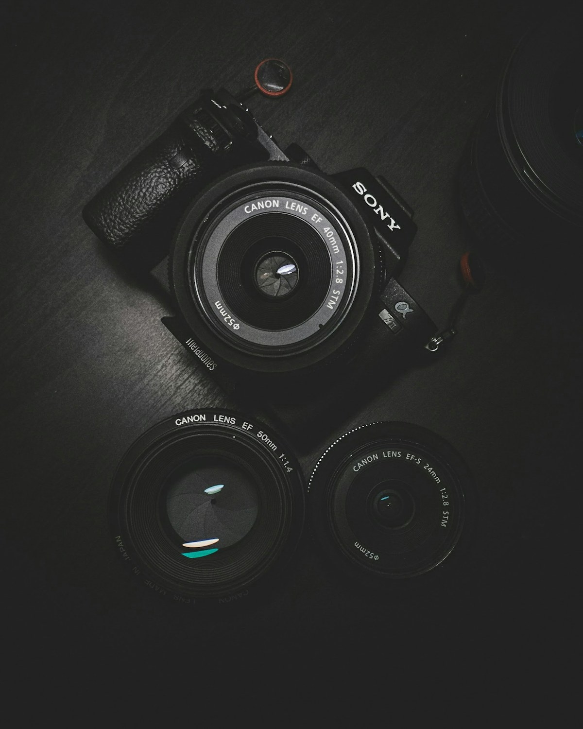 Compact black camera and lenses